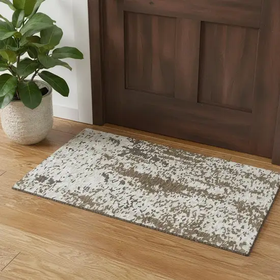 Brown Ivory And Beige Abstract Washable Area Rug With UV Protection Photo 1