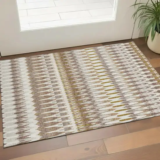 Brown Ivory And Beige Southwestern Washable Area Rug With UV Protection Photo 1