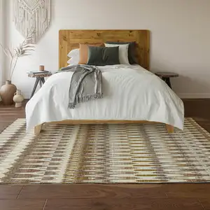 Photo of Brown Ivory And Beige Southwestern Washable Area Rug With UV Protection