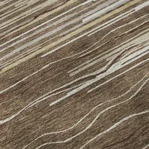 Photo of Brown Ivory And Beige Striped Washable Area Rug With UV Protection