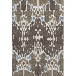 Photo of Brown Ivory And Blue Ikat Washable Area Rug With UV Protection