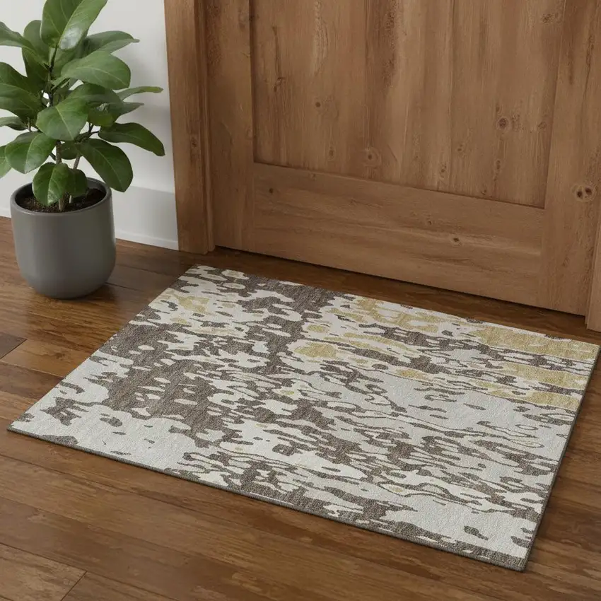 Brown Ivory And Gold Abstract Washable Area Rug With UV Protection Photo 1