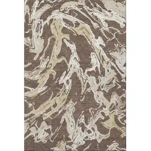 Photo of Brown Ivory And Gold Abstract Washable Area Rug With UV Protection