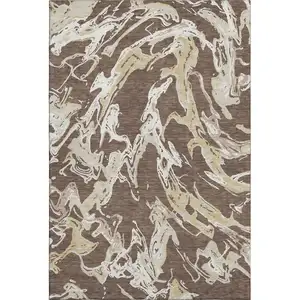 Photo of Brown Ivory And Gold Abstract Washable Area Rug With UV Protection