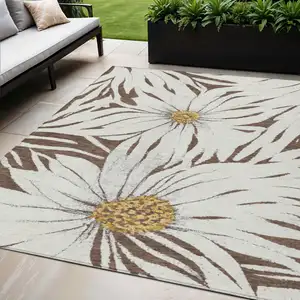 Photo of Brown Ivory And Gold Floral Washable Indoor Outdoor Area Rug