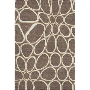 Photo of Brown Ivory And Gold Geometric Washable Area Rug With UV Protection