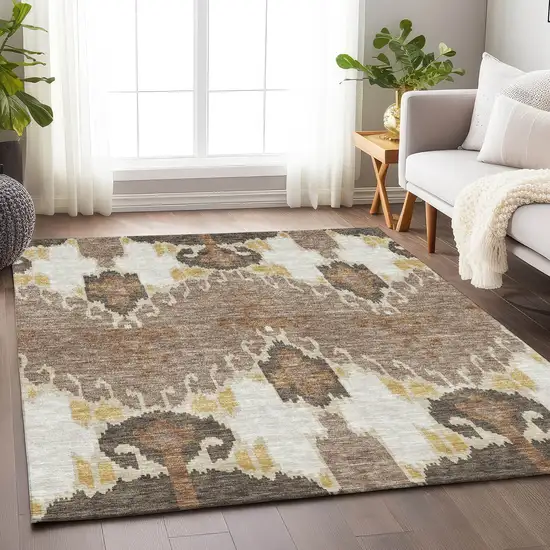 Brown Ivory And Gold Ikat Washable Area Rug With UV Protection Photo 5