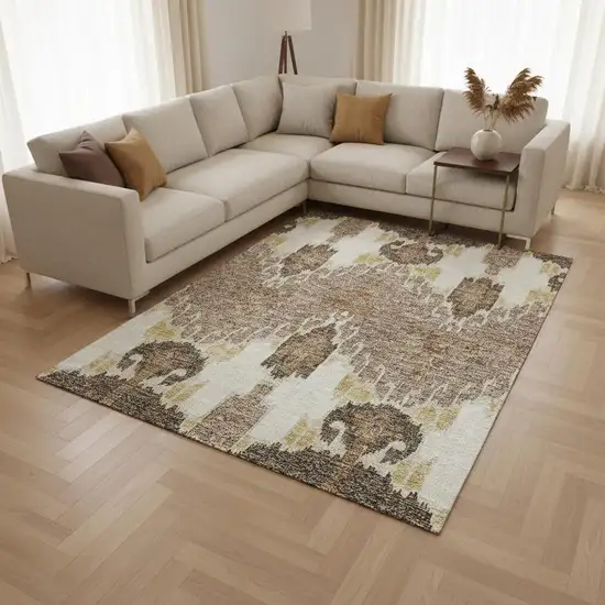 Brown Ivory And Gold Ikat Washable Area Rug With UV Protection Photo 2