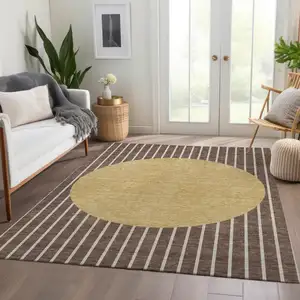 Photo of Brown Ivory And Gold Striped Washable Area Rug With UV Protection