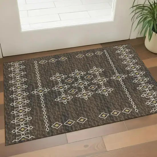 Brown Ivory And Gold Tribal Washable Area Rug With UV Protection Photo 1