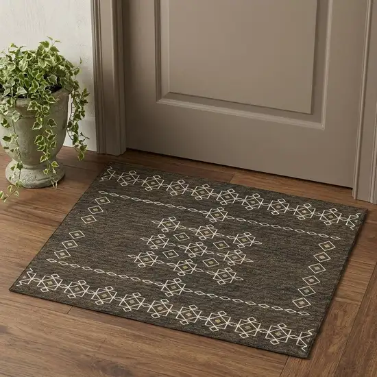 Brown Ivory And Gold Tribal Washable Area Rug With UV Protection Photo 1