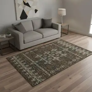 Photo of Brown Ivory And Gold Tribal Washable Area Rug With UV Protection
