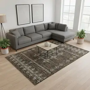 Photo of Brown Ivory And Gold Tribal Washable Area Rug With UV Protection