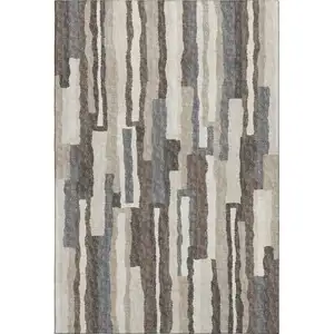 Photo of Brown Ivory And Gray Abstract Washable Area Rug With UV Protection
