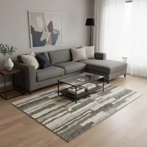 Photo of Brown Ivory And Gray Abstract Washable Area Rug With UV Protection