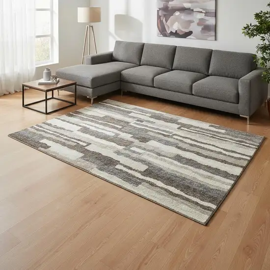 Brown Ivory And Gray Abstract Washable Area Rug With UV Protection Photo 1