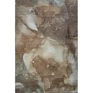 Photo of Brown Ivory And Gray Abstract Washable Area Rug With UV Protection