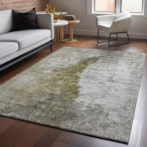 Photo of Brown Ivory And Gray Abstract Washable Area Rug With UV Protection