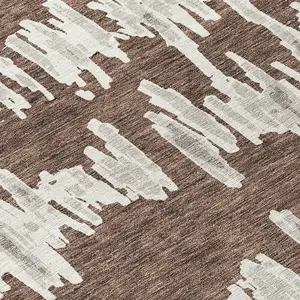 Photo of Brown Ivory And Gray Striped Washable Indoor Outdoor Area Rug