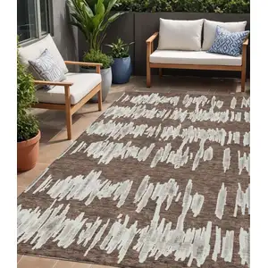Photo of Brown Ivory And Gray Striped Washable Indoor Outdoor Area Rug