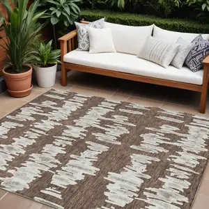 Photo of Brown Ivory And Gray Striped Washable Indoor Outdoor Area Rug