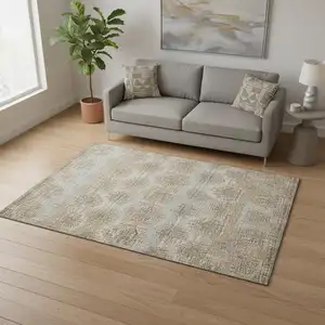 Photo of Brown Ivory And Sky Blue Abstract Washable Area Rug With UV Protection