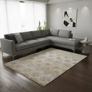 Photo of Brown Ivory And Sky Blue Abstract Washable Area Rug With UV Protection