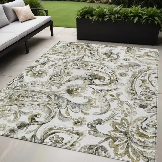 Brown Ivory And Tan Paisley Washable Indoor Outdoor Area Rug Photo 1