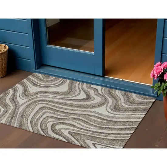 Brown Ivory And Taupe Abstract Washable Indoor Outdoor Area Rug Photo 1