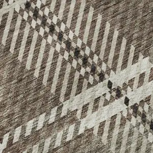 Photo of Brown Ivory And Taupe Plaid Washable Area Rug With UV Protection