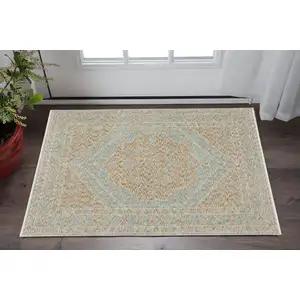 Photo of Brown Medallion Area Rug With Fringe