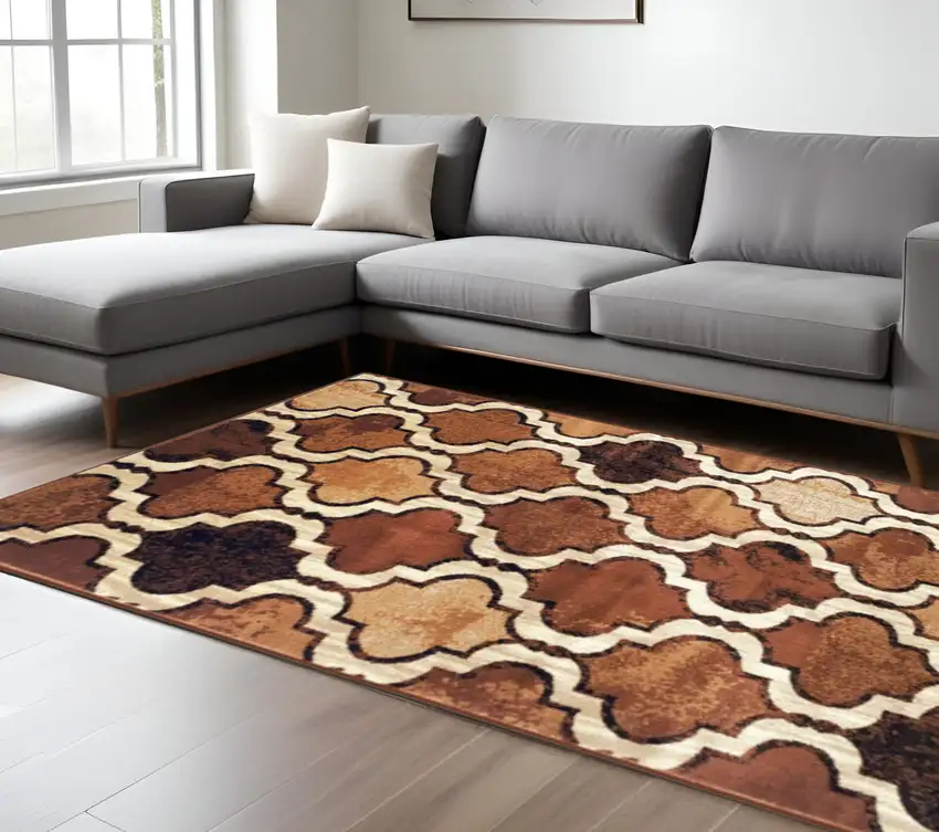 Brown And Ivory Quatrefoil Distressed Area Rug Photo 1