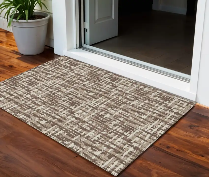 Brown Tan And Beige Abstract Washable Indoor Outdoor Area Rug Photo 1