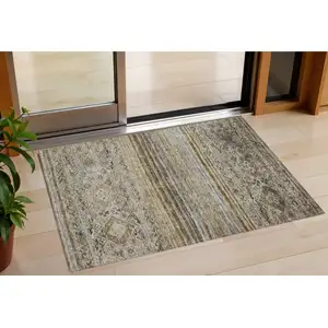 Photo of Brown Tan And Black Floral Washable Indoor Outdoor Area Rug