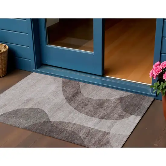 Brown Taupe And Beige Abstract Washable Indoor Outdoor Area Rug Photo 1