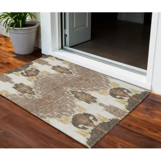 Brown Taupe And Beige Ikat Washable Indoor Outdoor Area Rug Photo 1