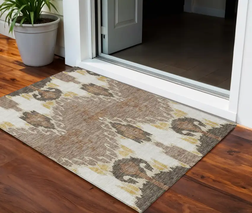 Brown Taupe And Beige Ikat Washable Indoor Outdoor Area Rug Photo 1