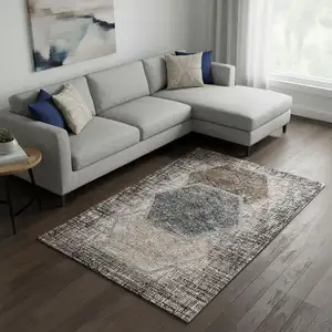 Photo of Brown Taupe And Charcoal Geometric Washable Area Rug With UV Protection