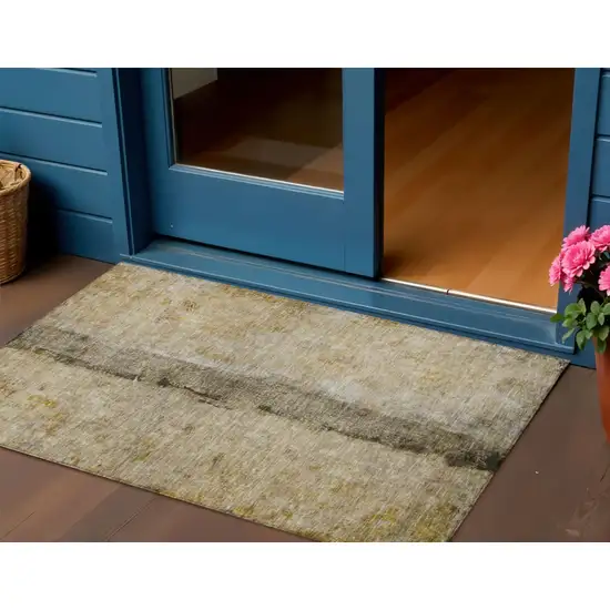 Brown Taupe And Gold Abstract Washable Indoor Outdoor Area Rug Photo 1