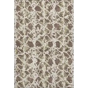 Photo of Brown Taupe And Ivory Abstract Washable Area Rug With UV Protection