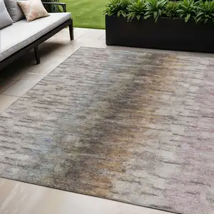 Photo of Brown Taupe And Ivory Abstract Washable Indoor Outdoor Area Rug