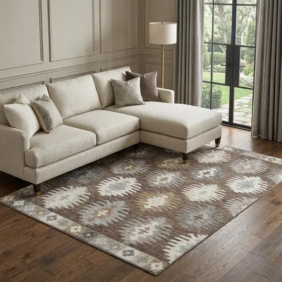 Brown Taupe And Ivory Southwestern Washable Area Rug With UV Protection Photo 1