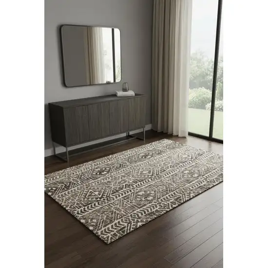 Brown Taupe And Ivory Striped Stain Resistant Area Rug Photo 1