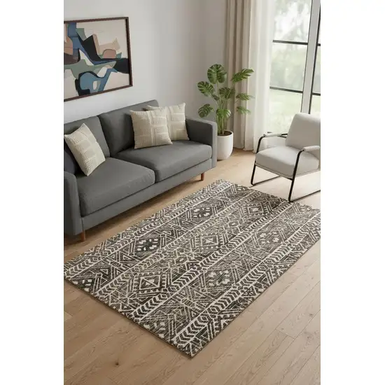 Brown Taupe And Ivory Striped Stain Resistant Area Rug Photo 1