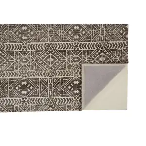 Photo of Brown Taupe And Ivory Striped Stain Resistant Area Rug
