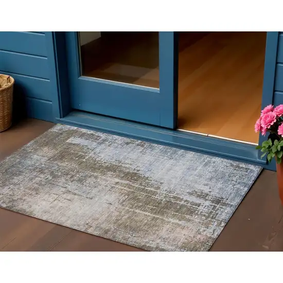 Brown Taupe And Navy Blue Abstract Washable Indoor Outdoor Area Rug Photo 1