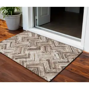 Photo of Brown Taupe And Tan Geometric Washable Indoor Outdoor Area Rug