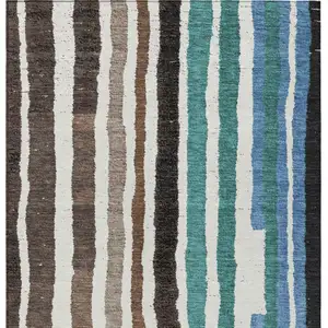 Photo of Brown Teal Blue And Ivory Striped Washable Indoor Outdoor Area Rug