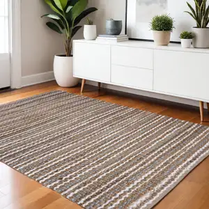 Photo of Brown White And Gray Jute Striped Hand Woven Area Rug