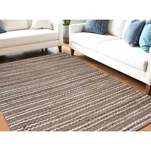Photo of Brown White And Gray Jute Striped Hand Woven Area Rug